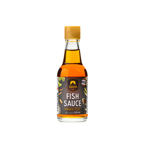 Bottle of SIAM fish sauce with a gold cap on a white background