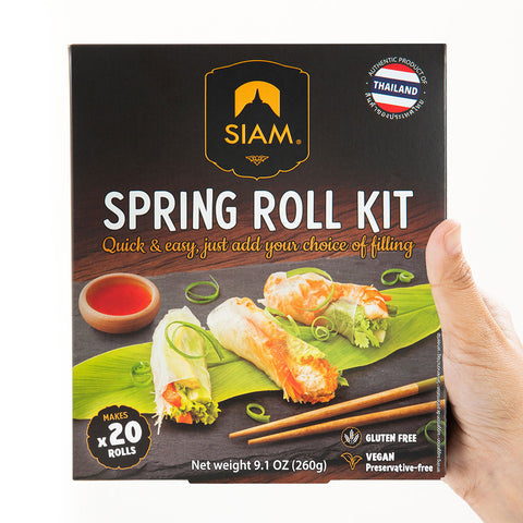 Siam Spring Roll Kit packaging held by a hand on a white background